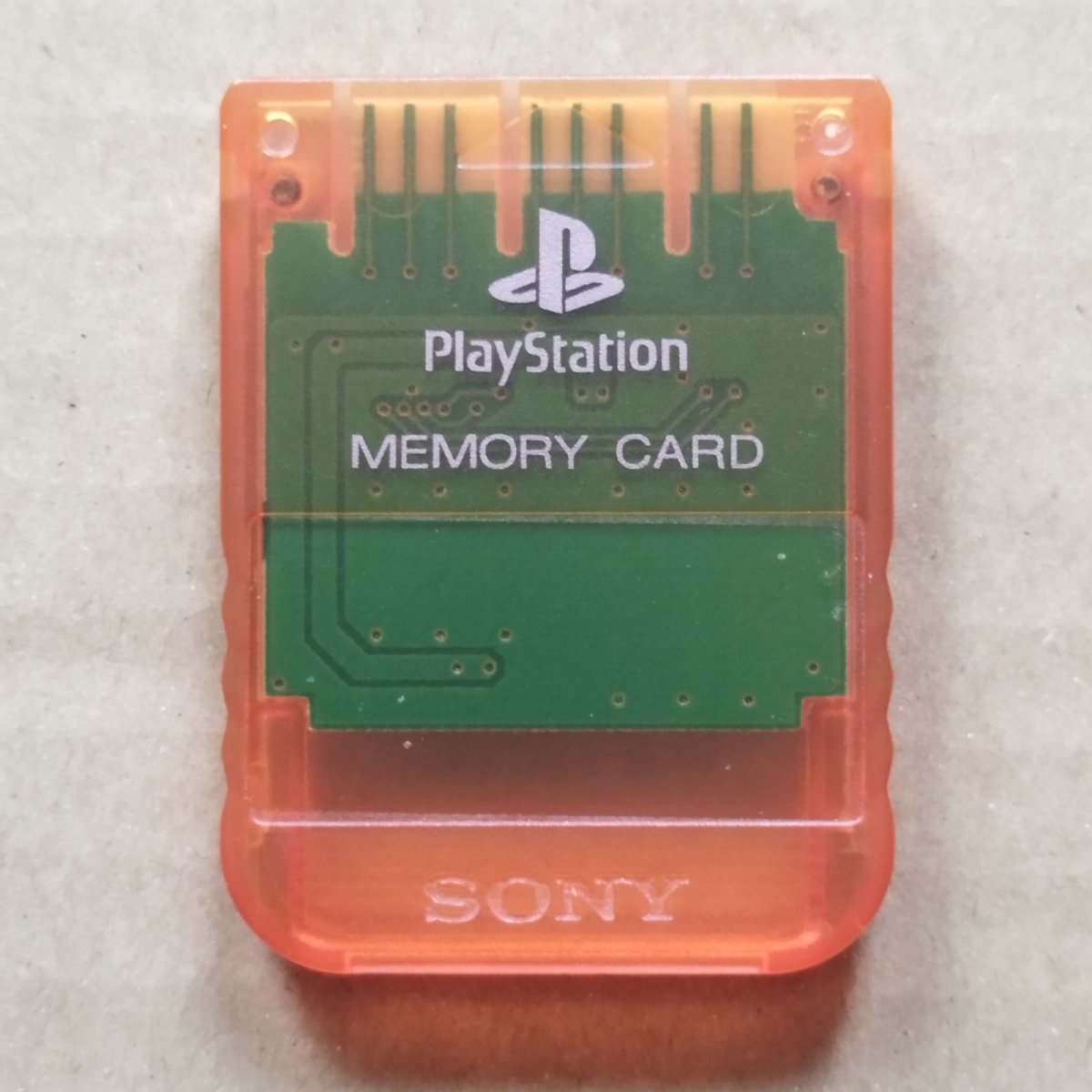 画像1: メモリーカード　クリアオレンジ　SCPH-1020　箱説無　PS1プレイステーション【1-7】 (1)