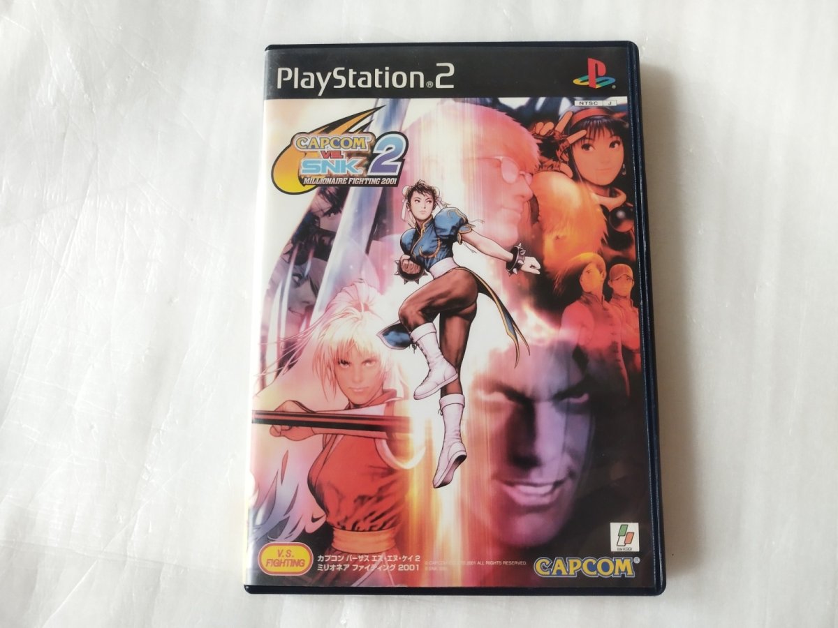 画像1: 【減額品】CAPCOM VS. SNK 2 MILLIONAIRE FIGHTING 2001　箱説有　PS2プレイステーション【6h7】 (1)