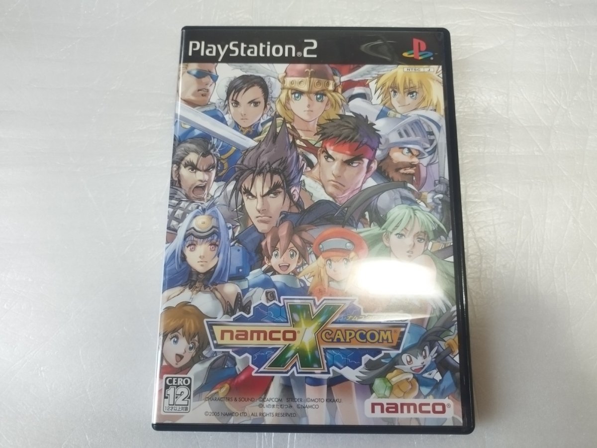 画像1: 【美品評価価格】ナムコクロスカプコン　チラシ葉書　箱説有　PS2プレイステーション【4h8】 (1)