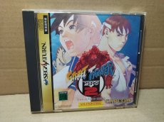画像1: 【美品評価価格】ストリートファイターZERO2　帯葉書箱説有　SSセガサターン【4h5】 (1)